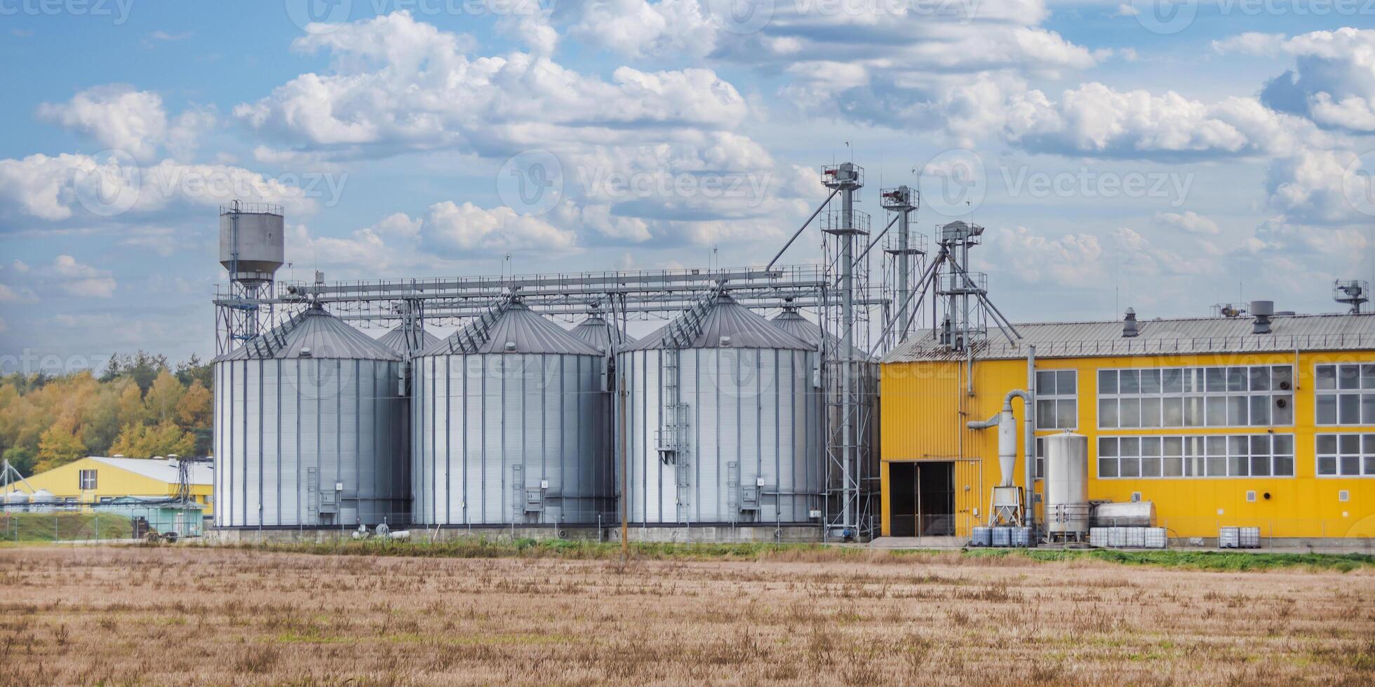 agro-processing and manufacturing plant for processing and silver silos for drying cleaning and storage of agricultural products, flour, cereals and grain. Granary elevator photo
