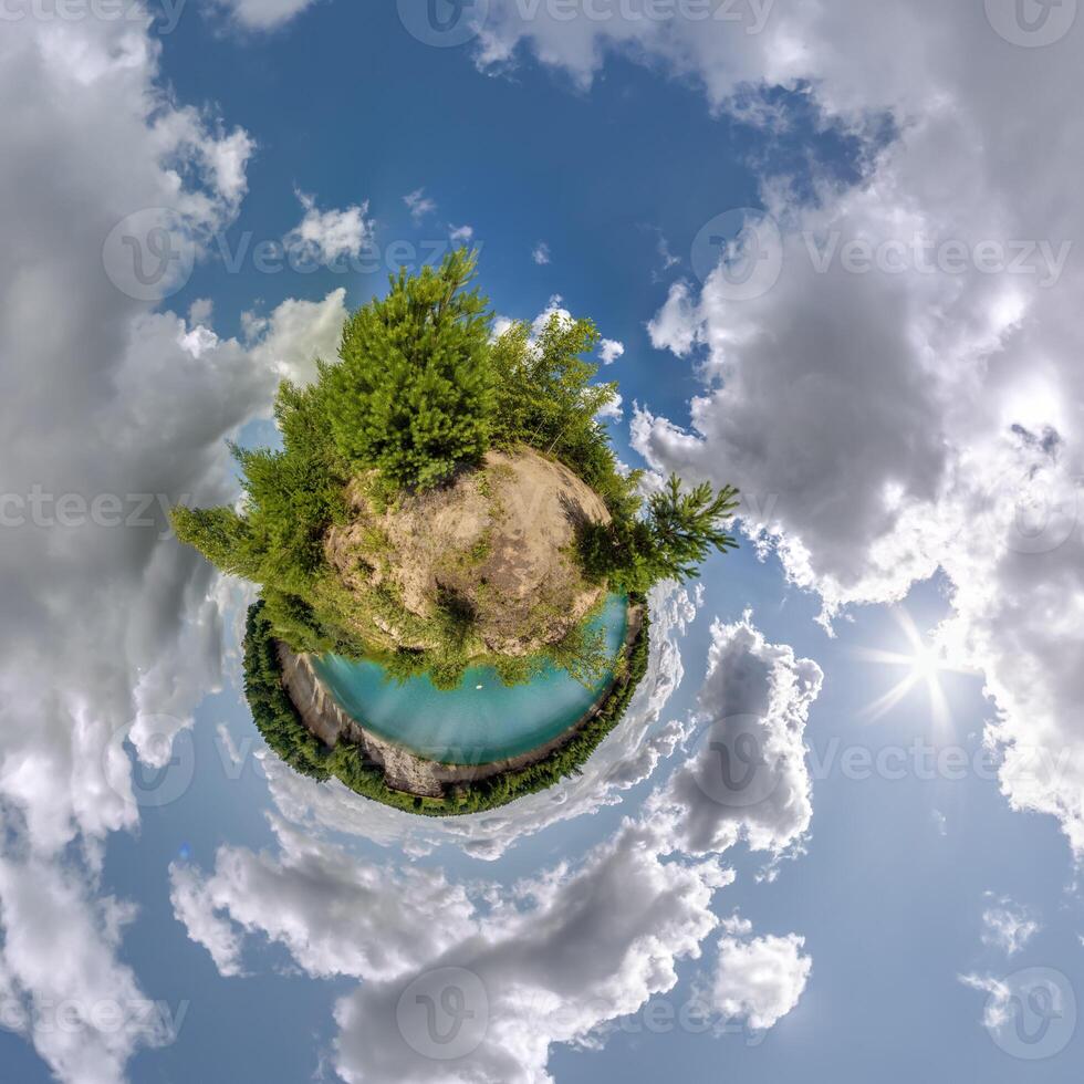 simple little tiny planet without buildings in blue sky with sun and beautiful clouds. Transformation of spherical panorama 360 degrees. Spherical abstract aerial view. Curvature of space. photo