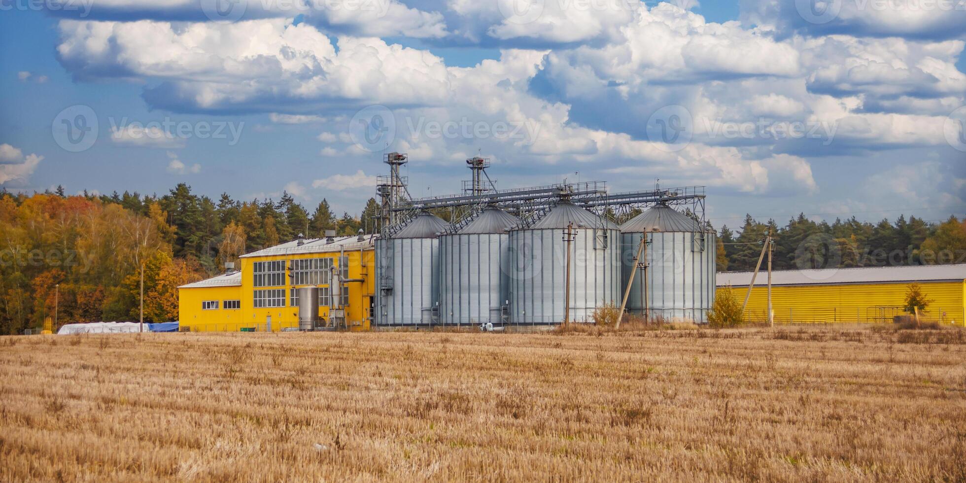 agro-processing and manufacturing plant for processing and silver silos for drying cleaning and storage of agricultural products, flour, cereals and grain. Granary elevator photo
