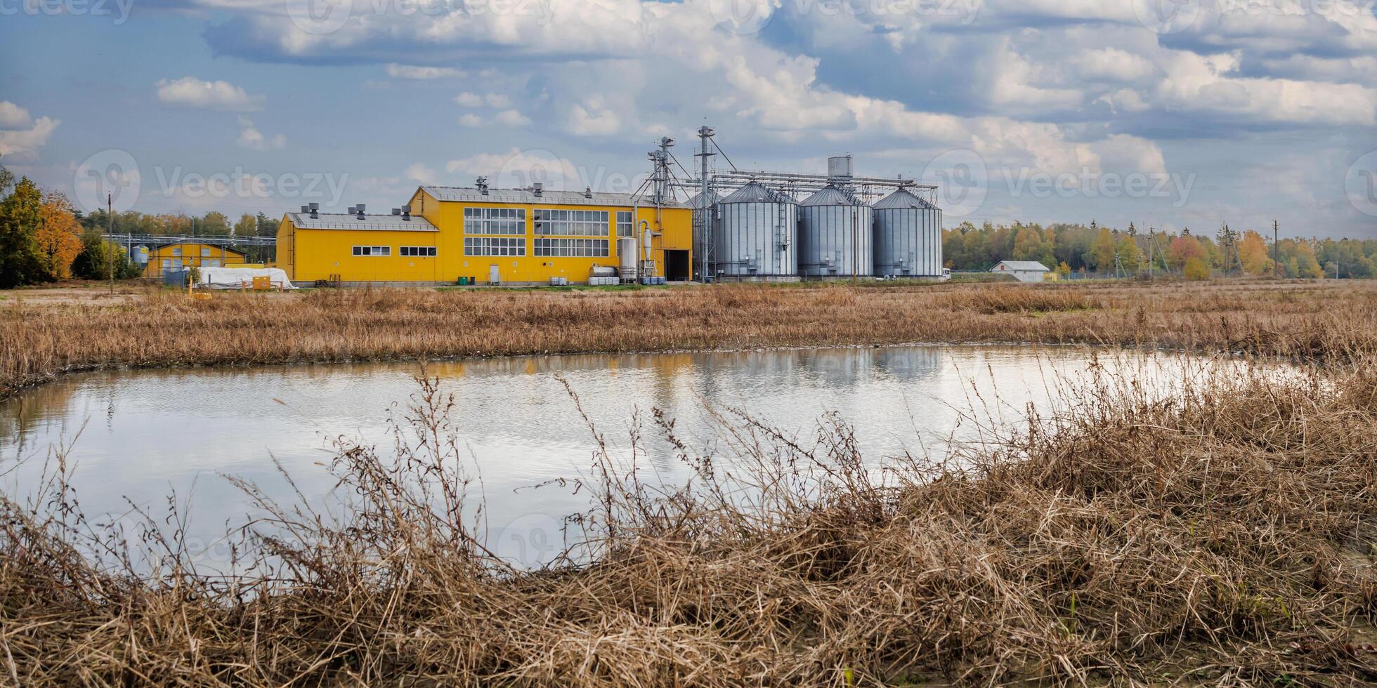 agro-processing and manufacturing plant for processing and silver silos for drying cleaning and storage of agricultural products, flour, cereals and grain. Granary elevator photo
