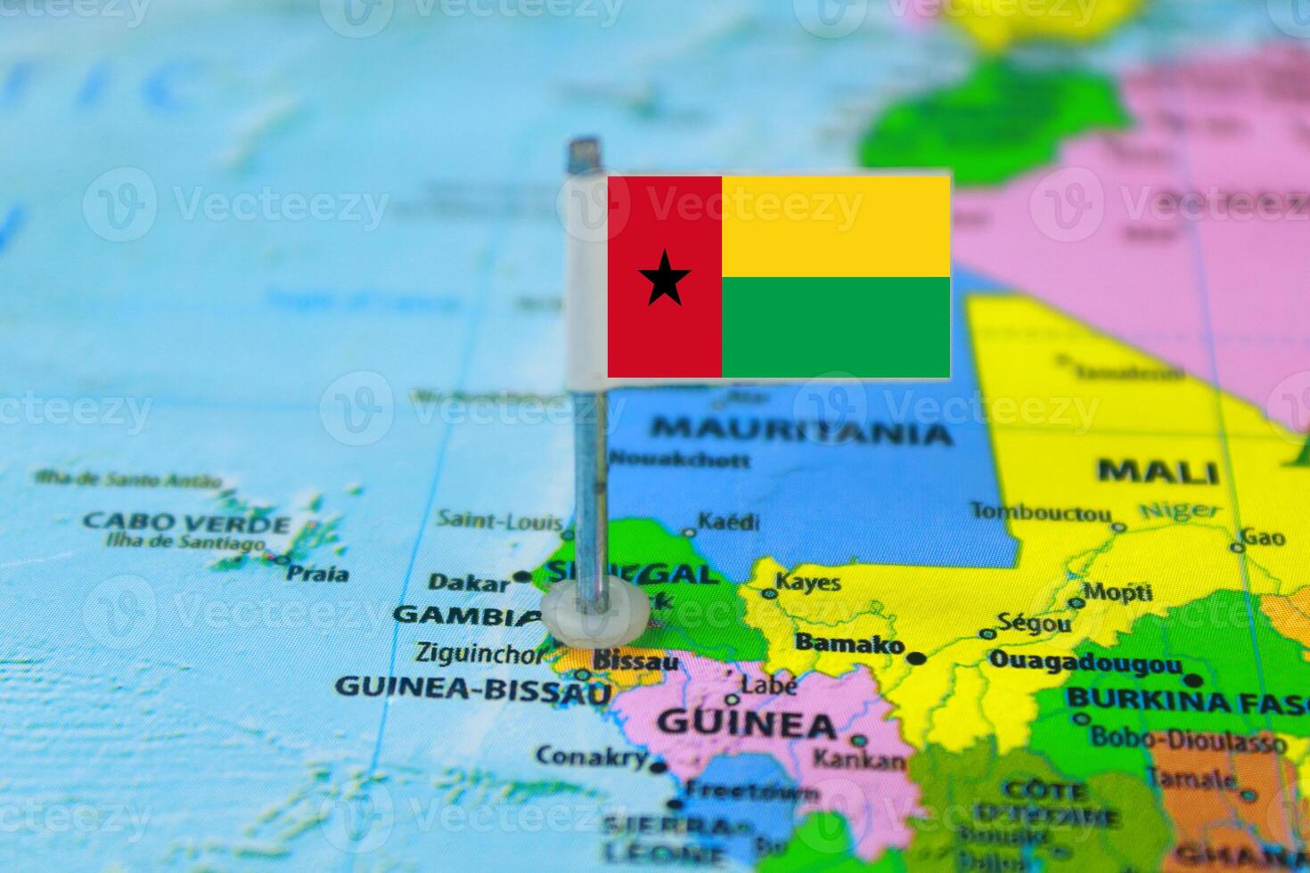 Guinea Bissau Flag Over World Map, Selectiove Focus photo