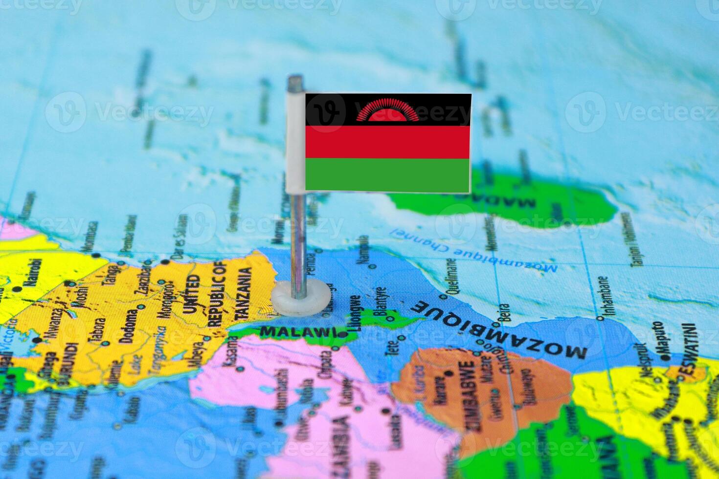 Malawi Flag Over World Map, Closeup view photo