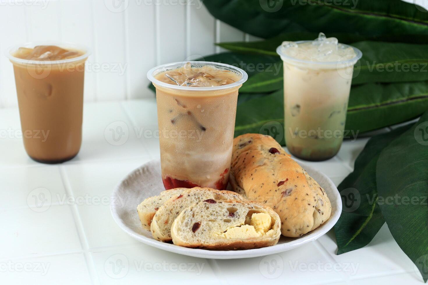 Sliced Cranberry Cream Cheese Bread with Strawberry Coffee Latte photo