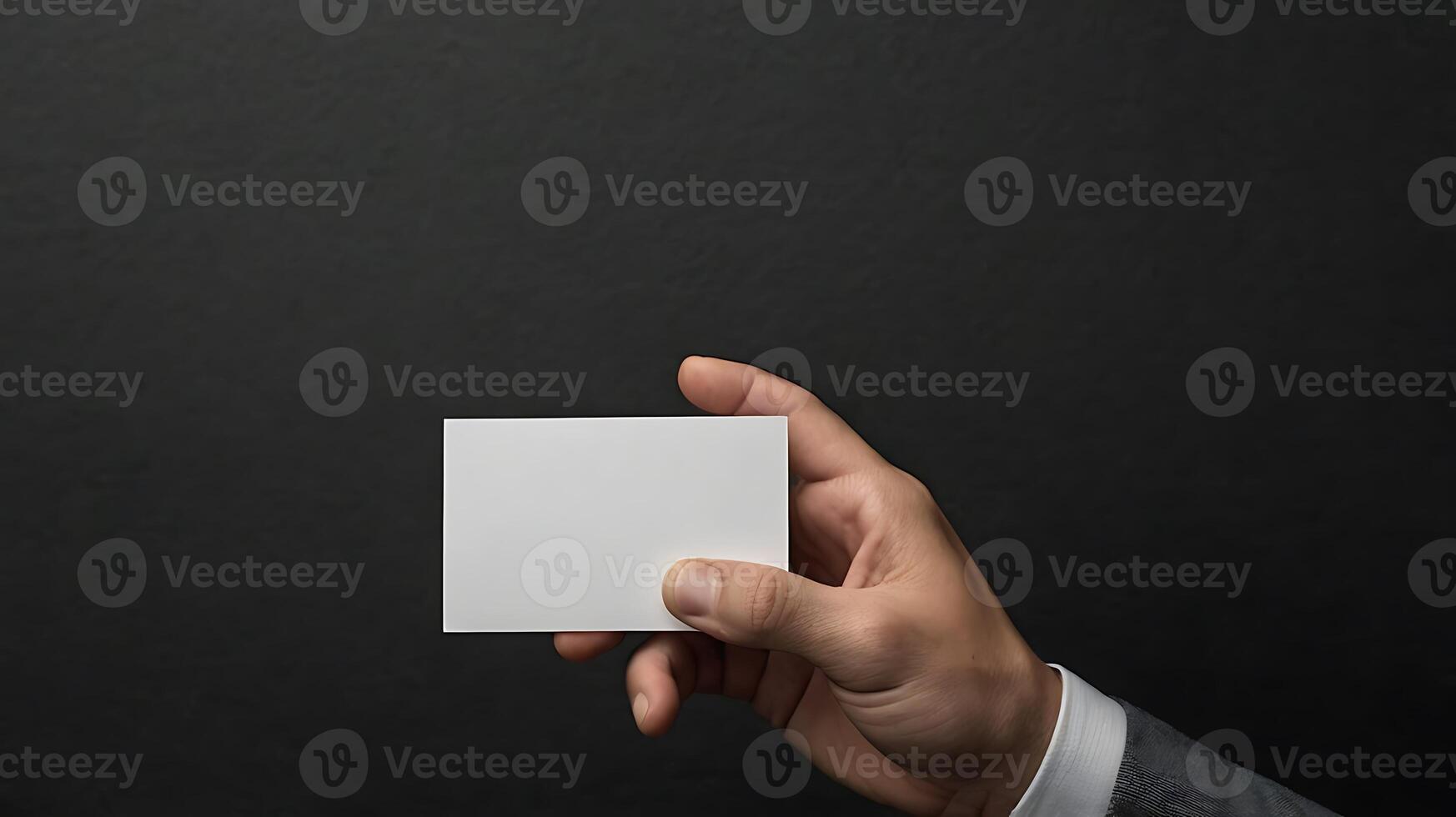 Hand hold white blank business card, business card mockup photo