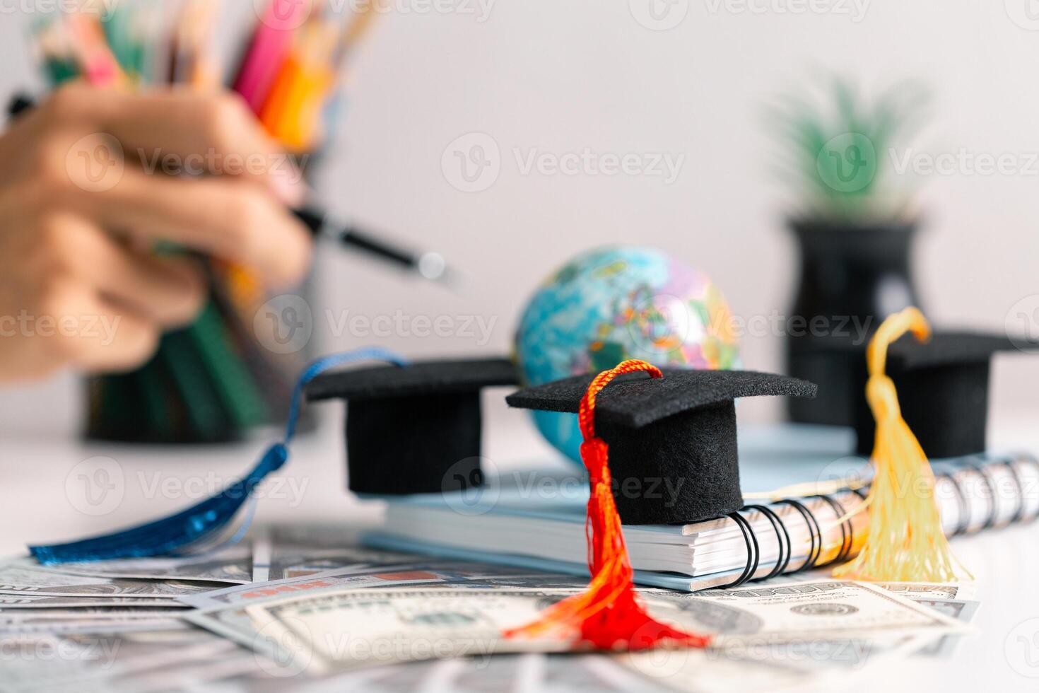 University graduate, holding their diploma and wearing cap and gown, celebrates their education with sense of accomplishment, ready to take on world. diverse, exchange, multicultural, foreign, learn photo