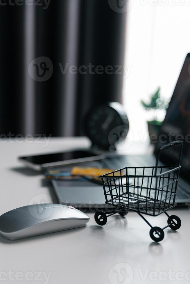 Effective marketing in e-business drives commerce by encouraging online shopping, where customers fill their carts and make purchases during sales, all within vast expanse of cyberspace. idea, pay photo