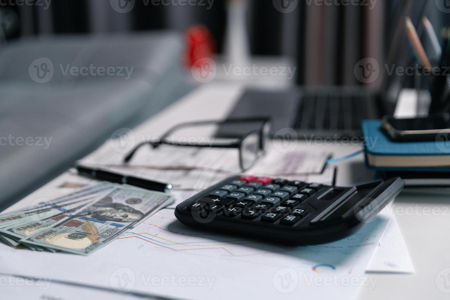 After inspecting finance documents and paperwork, he carefully calculated each tax deduction before filing, hoping for substantial refund on his income. interest, manager, pay, plan, preparation, irs photo
