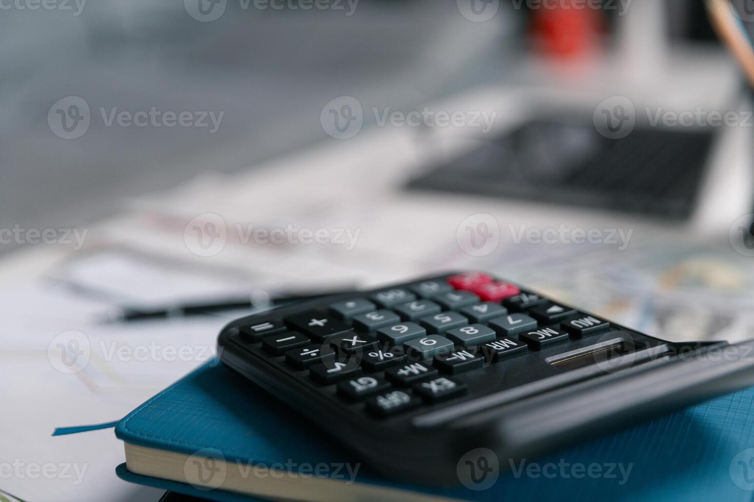 After inspecting finance documents and paperwork, he carefully calculated each tax deduction before filing, hoping for substantial refund on his income. interest, manager, pay, plan, preparation, irs photo