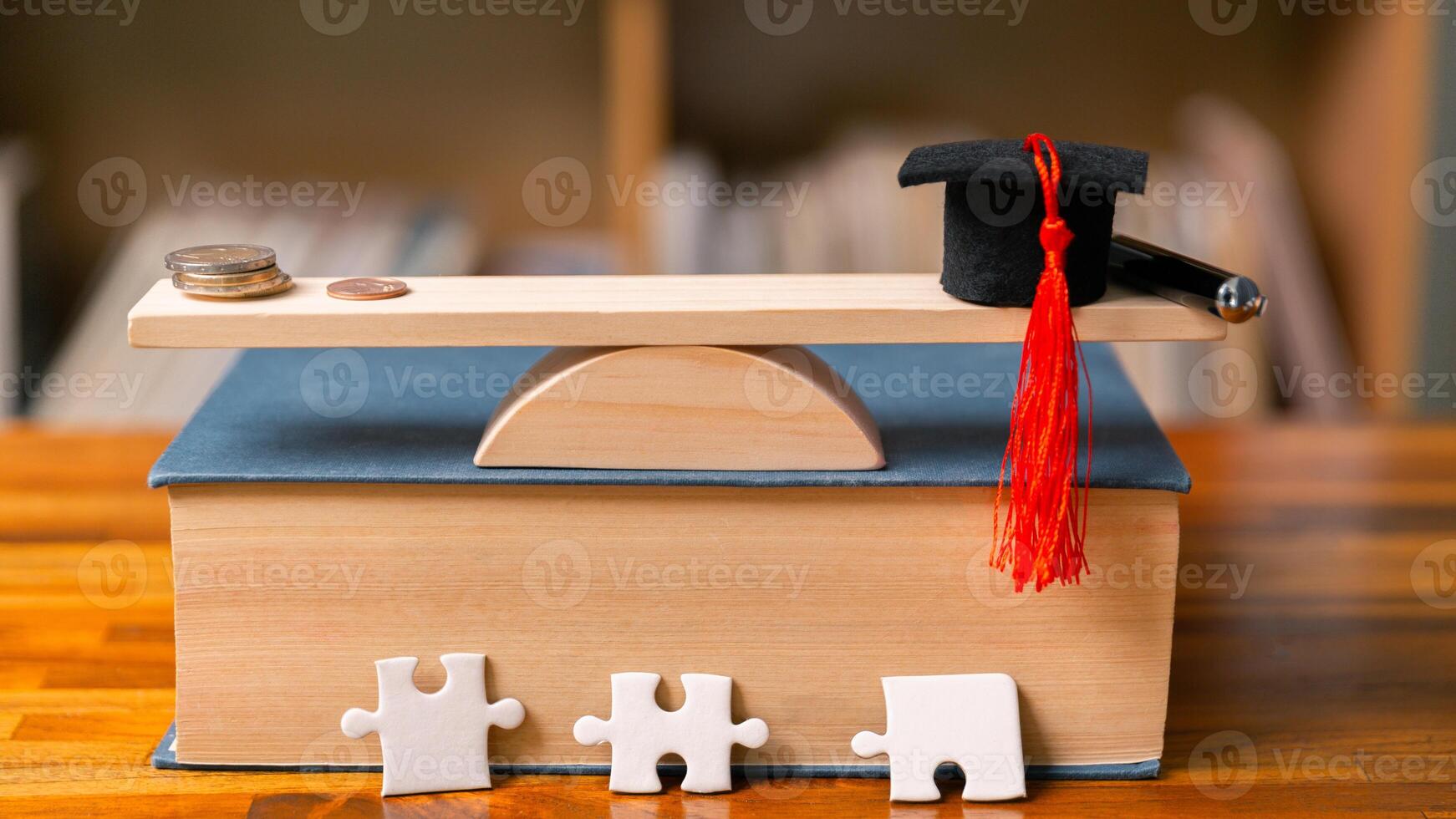 Planning for education abroad involves saving money and making wise investments in finance, which can lead to graduation success, future wealth, cognitive growth, and well-managed budget. hat, idea photo