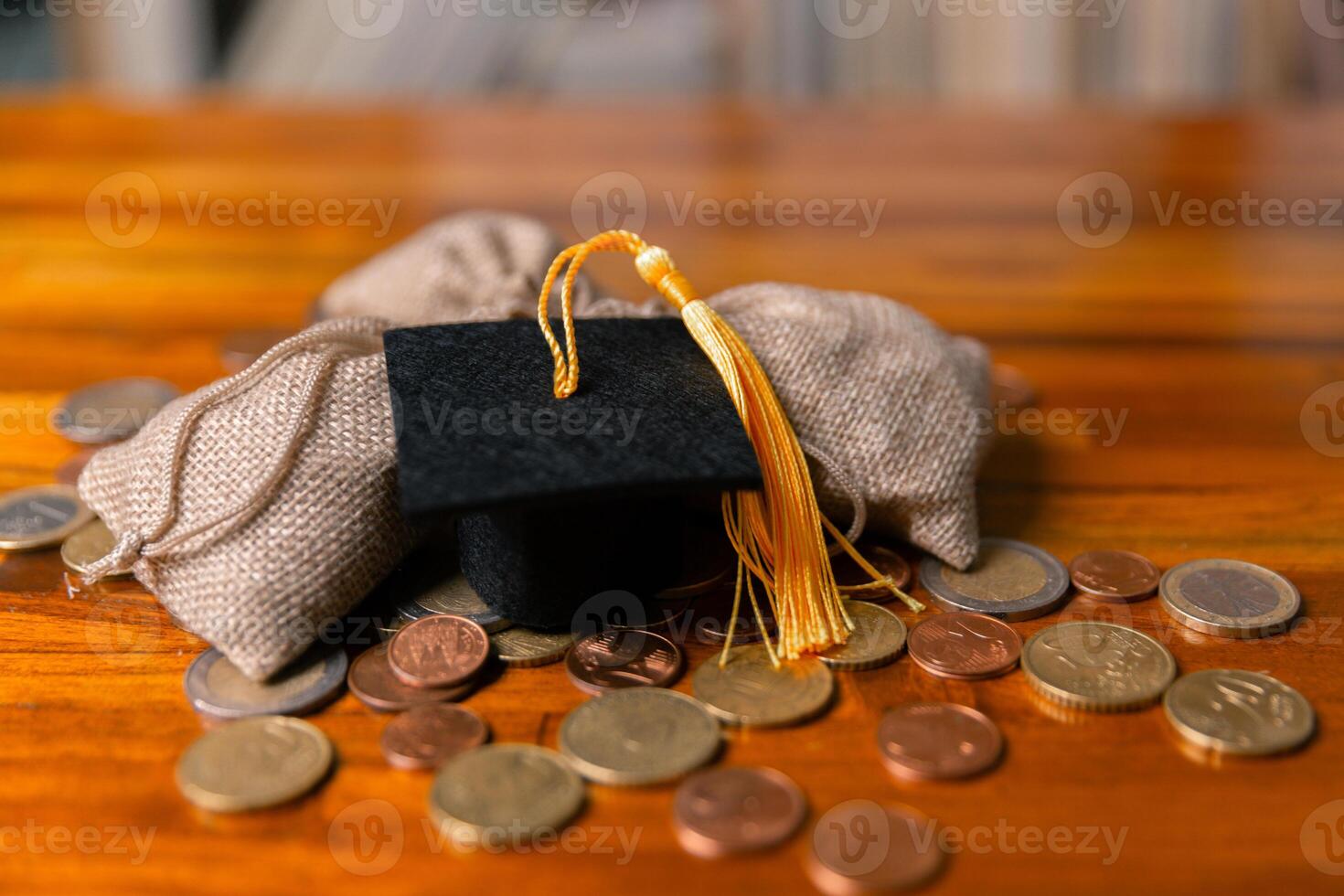 Planning for education abroad involves saving money and making wise investments in finance, which can lead to graduation success, future wealth, cognitive growth, and well-managed budget. hat, idea photo
