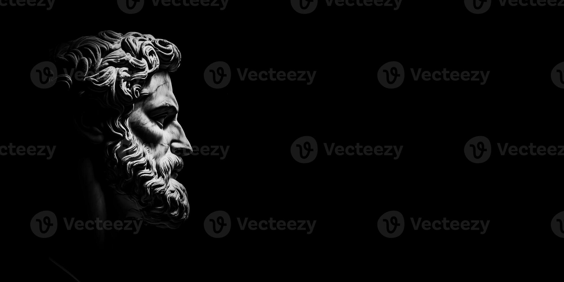 A dramatic black and white close-up of a classical statue's profile, showcasing intricate details of the beard and hair, set against a dark background. photo