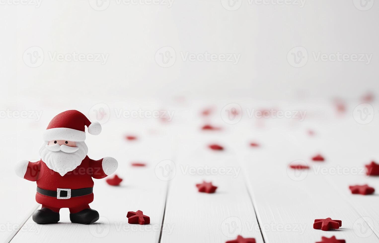 A small Santa Claus figurine stands on a white surface, surrounded by scattered red and white star-shaped decorations, creating a festive and minimalist holiday scene photo
