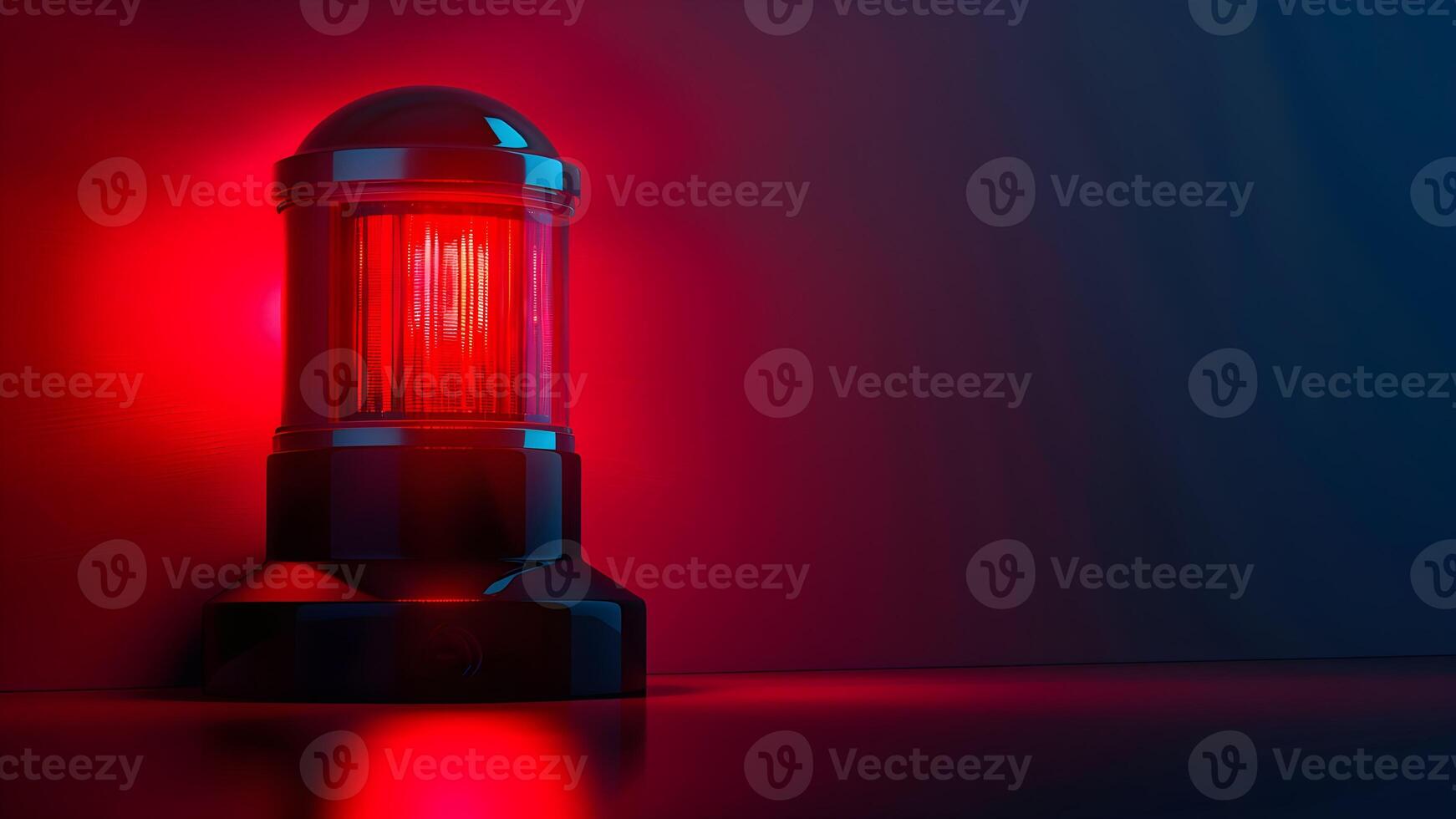 A red light is shining on a black surface photo