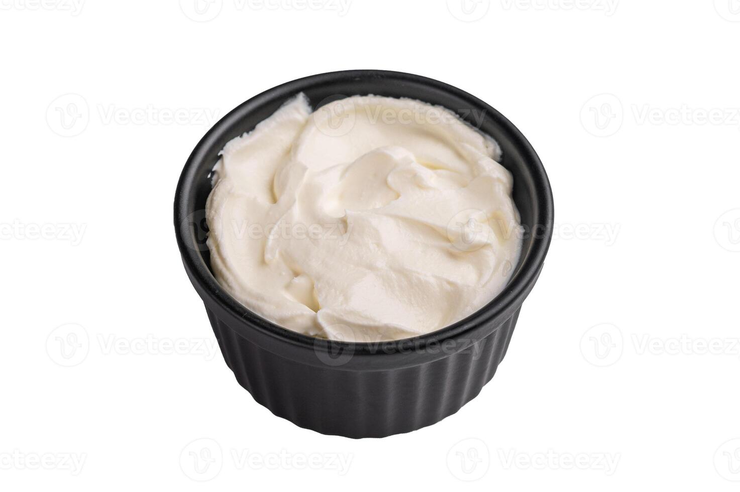 Fresh Sour cream in a bowl isoalted on white background. top view photo