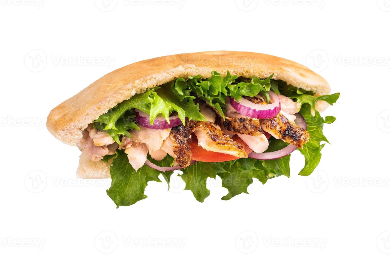 Gyros with grilled chicken meat, salad, tomato, onion, tzatziki in pita bread isolated on white background photo