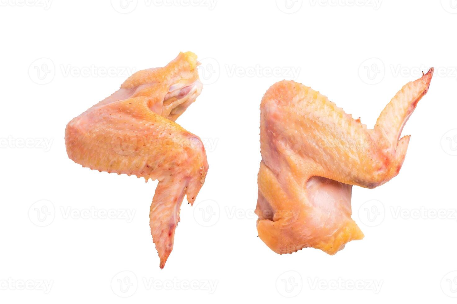 Two raw chicken wings from an eco farm are isolated on a white background, isolated on white background photo