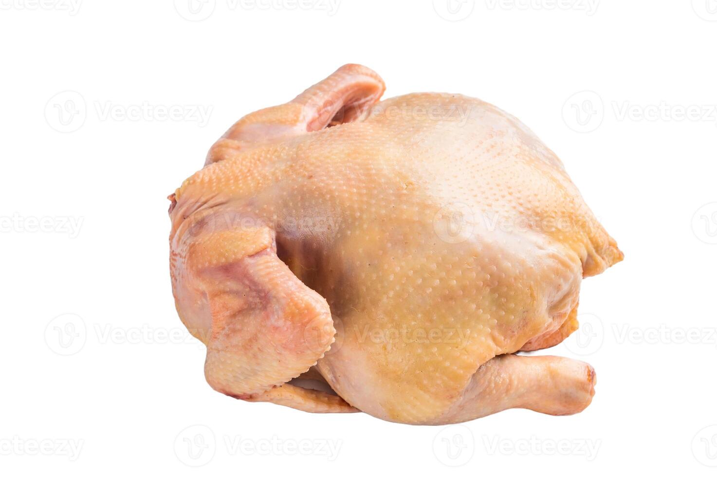 Raw eco farm chicken carcass on the cutting board isolated on white background photo