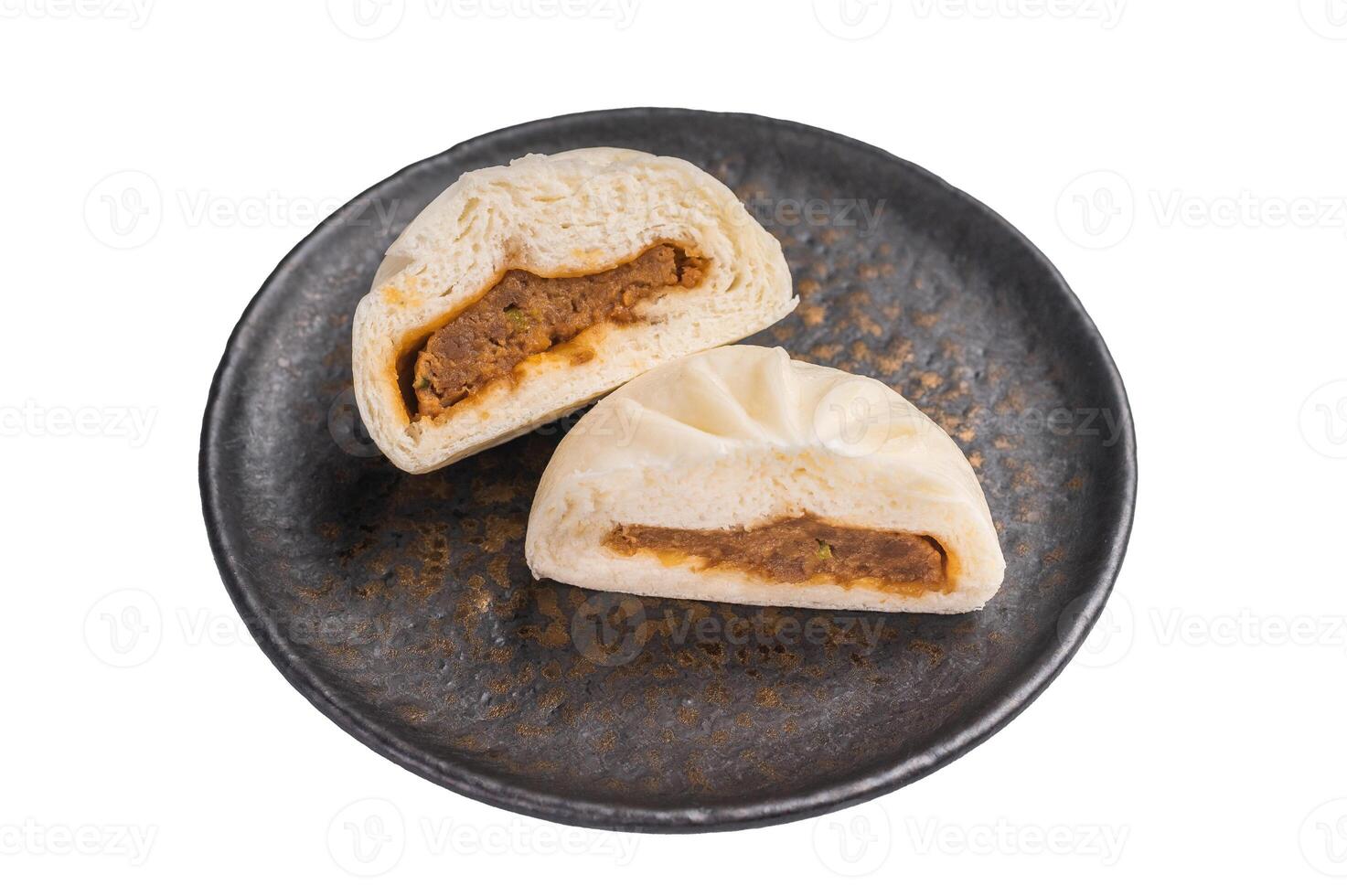 Baozi Bun, Chinese Steamed bun with meat on plate isolated on white background. top view photo
