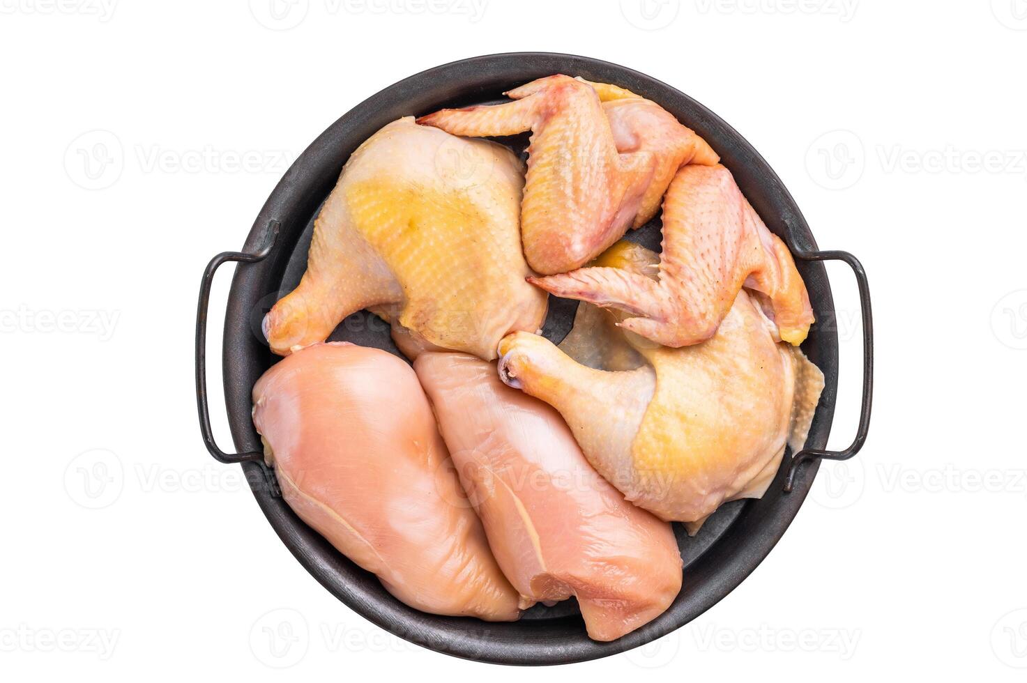 Raw chicken pieces in a black tray, ready for cooking,isolated on white background photo