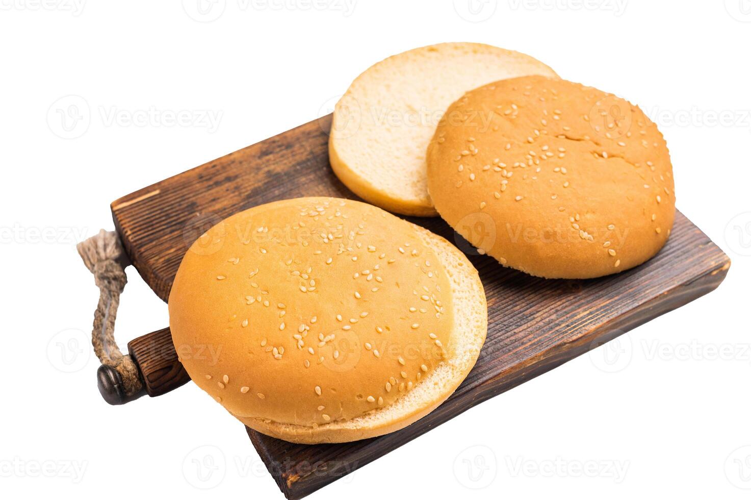 Baked burger buns isolated on white background. top view photo