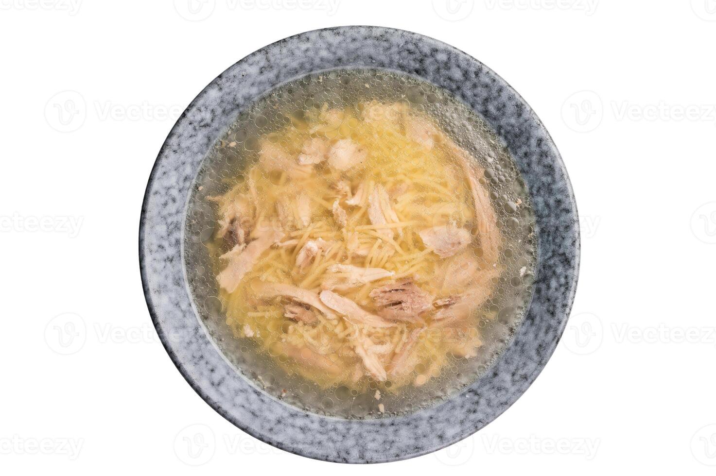 Chicken soup with Vermicelli and meat in a plate isolated on white background photo