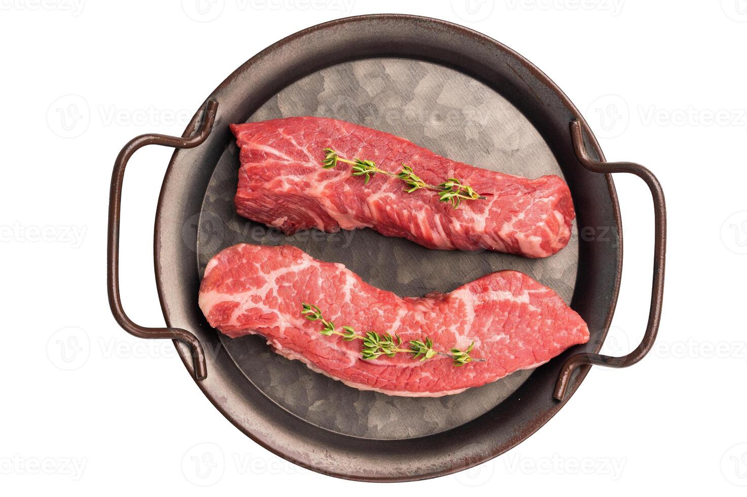 Raw Tri Tip Steak from Black Angus beef meat in stell tray isolated on white background photo