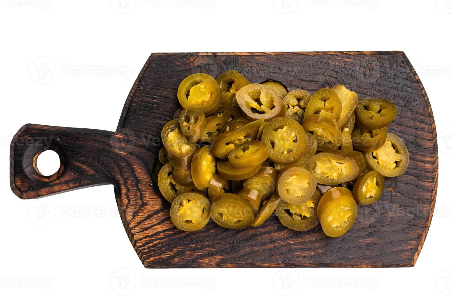 Pickled Marinated sliced Jalapeno, Green Mexican pepper on a wooden board isolated on white background photo