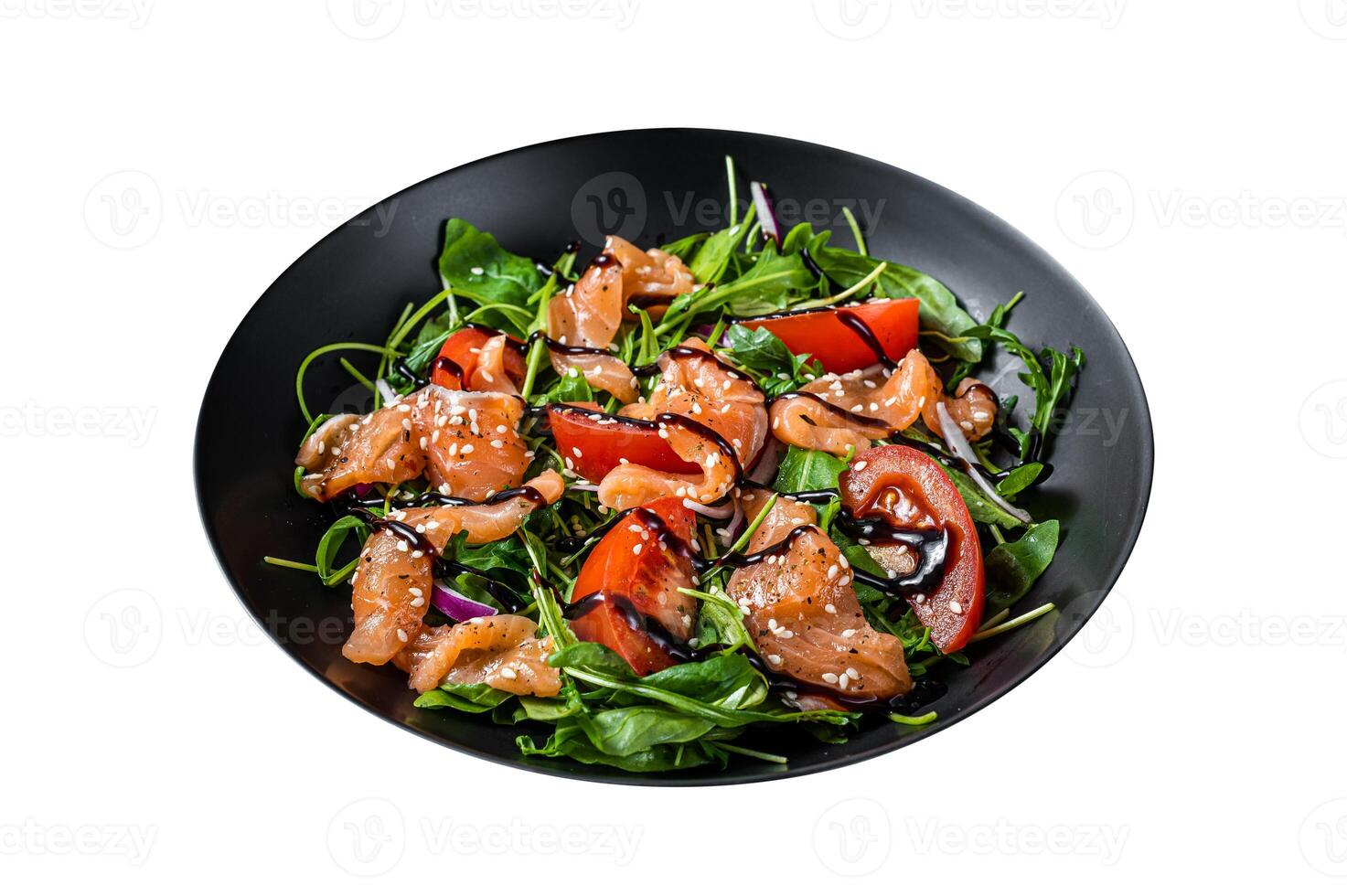 Salmon salad with fish slices, arugula, tomato and green vegetables. Isolated on white background. Top view. photo