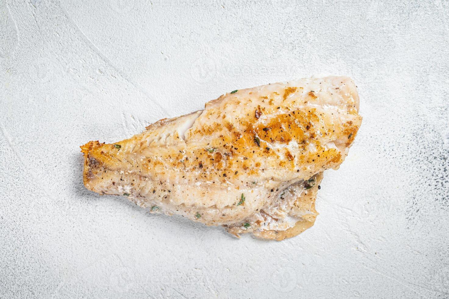 Grilled sea red perch fillet, Snapper fish. White background. Top view. Copy space photo