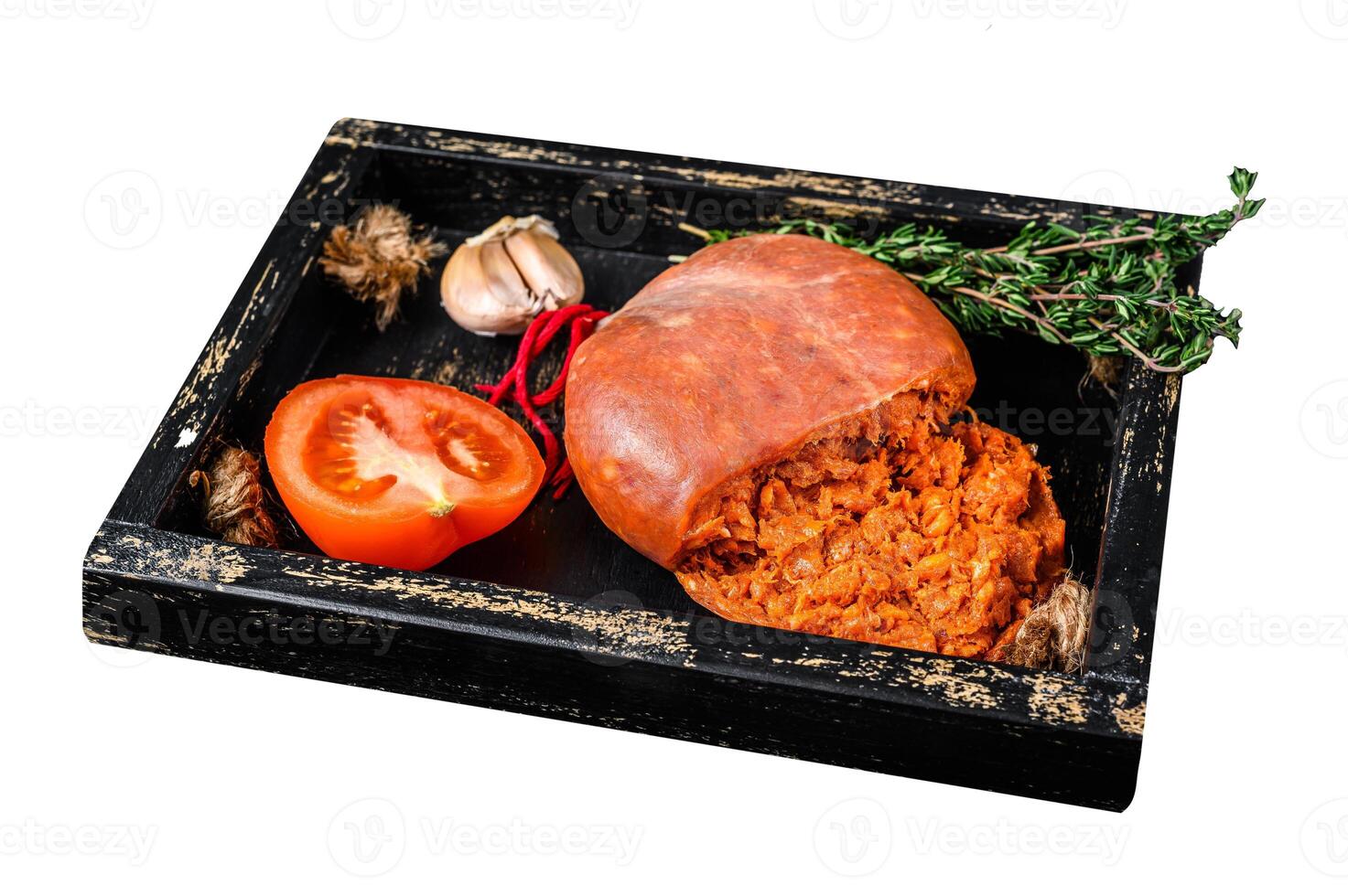 Mallorcan Sobrassada cured pork meat sausage in a wooden tray. Isolated on white background. Top view. photo