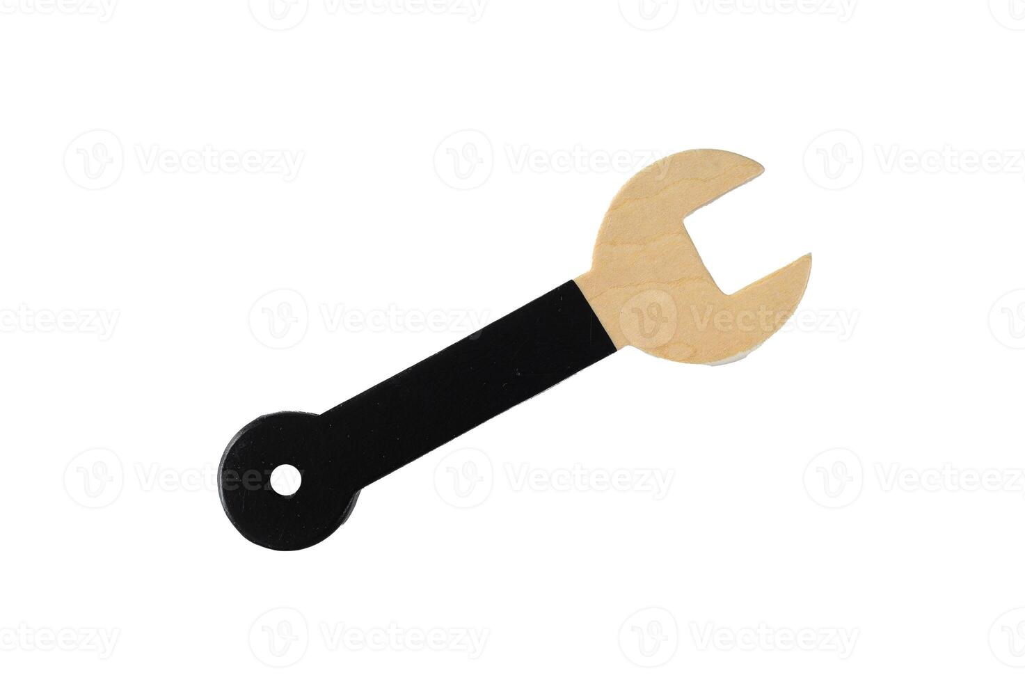 Baby wooden toy key hexagon on white background. Isolated on white background. photo