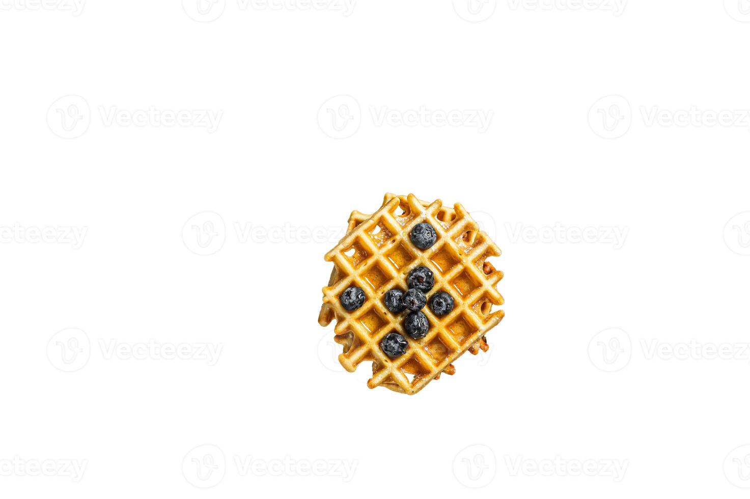 Fresh Belgian waffles with blueberry and Syrup in skillet. High quality Isolate, white background. photo