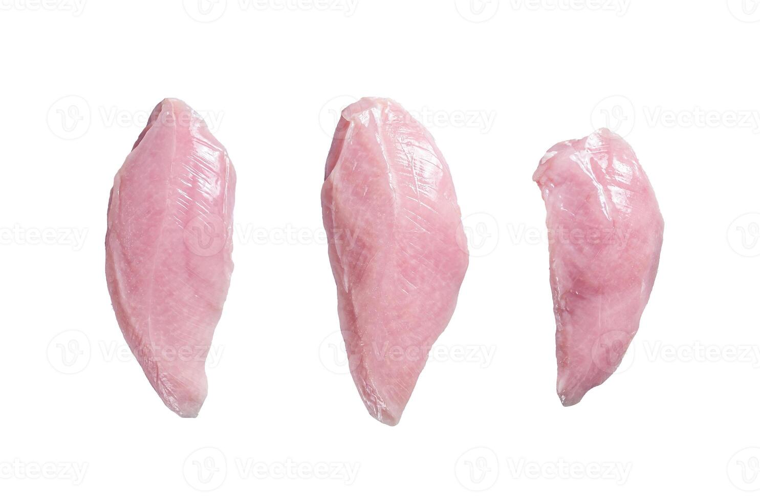 Raw Turkey Breasts fillet steaks. Isolated on white background. photo