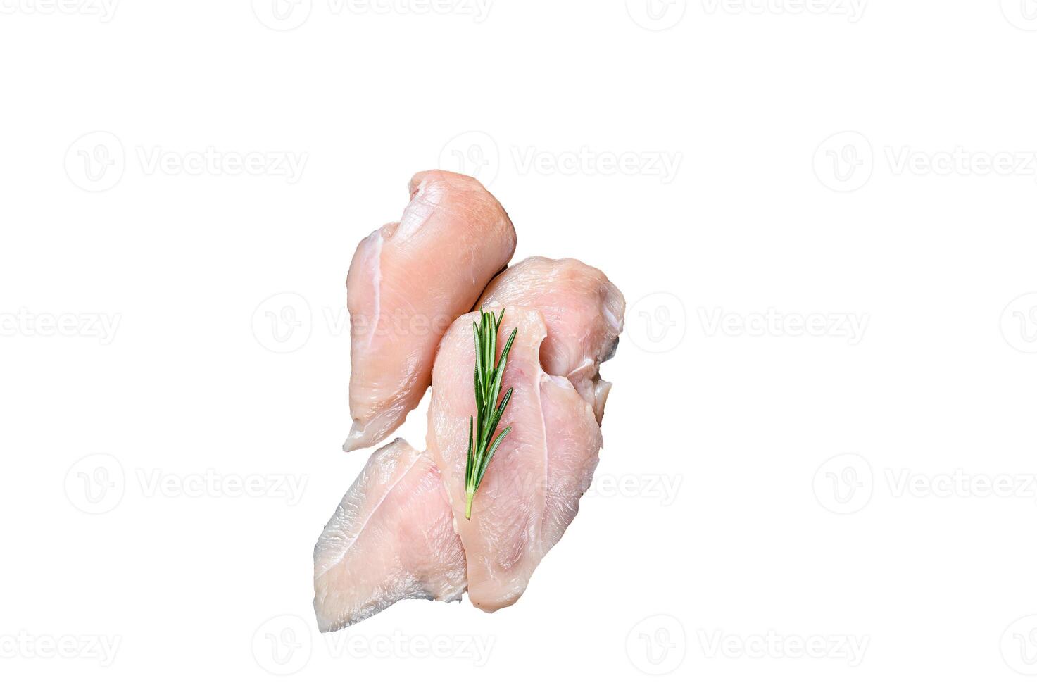 Fresh Raw sliced cut chicken breast fillet steaks on a wooden cutting board with kitchen knife. High quality Isolate, white background. photo