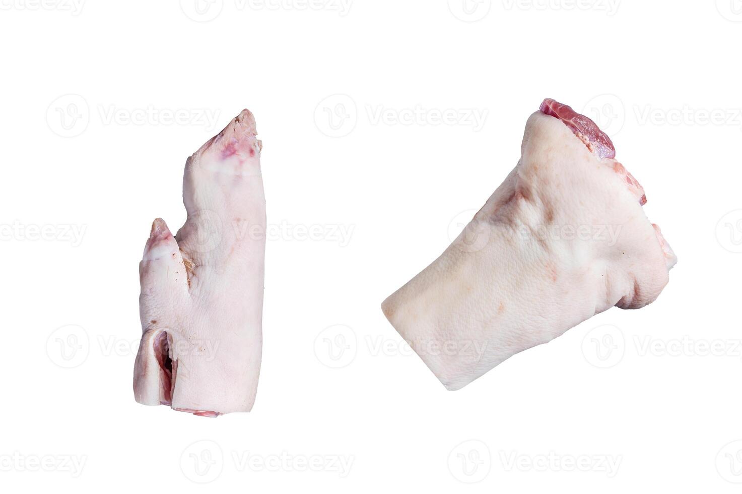Raw pork hoof, feet, trotters on a butcher board. Isolated on white background. photo