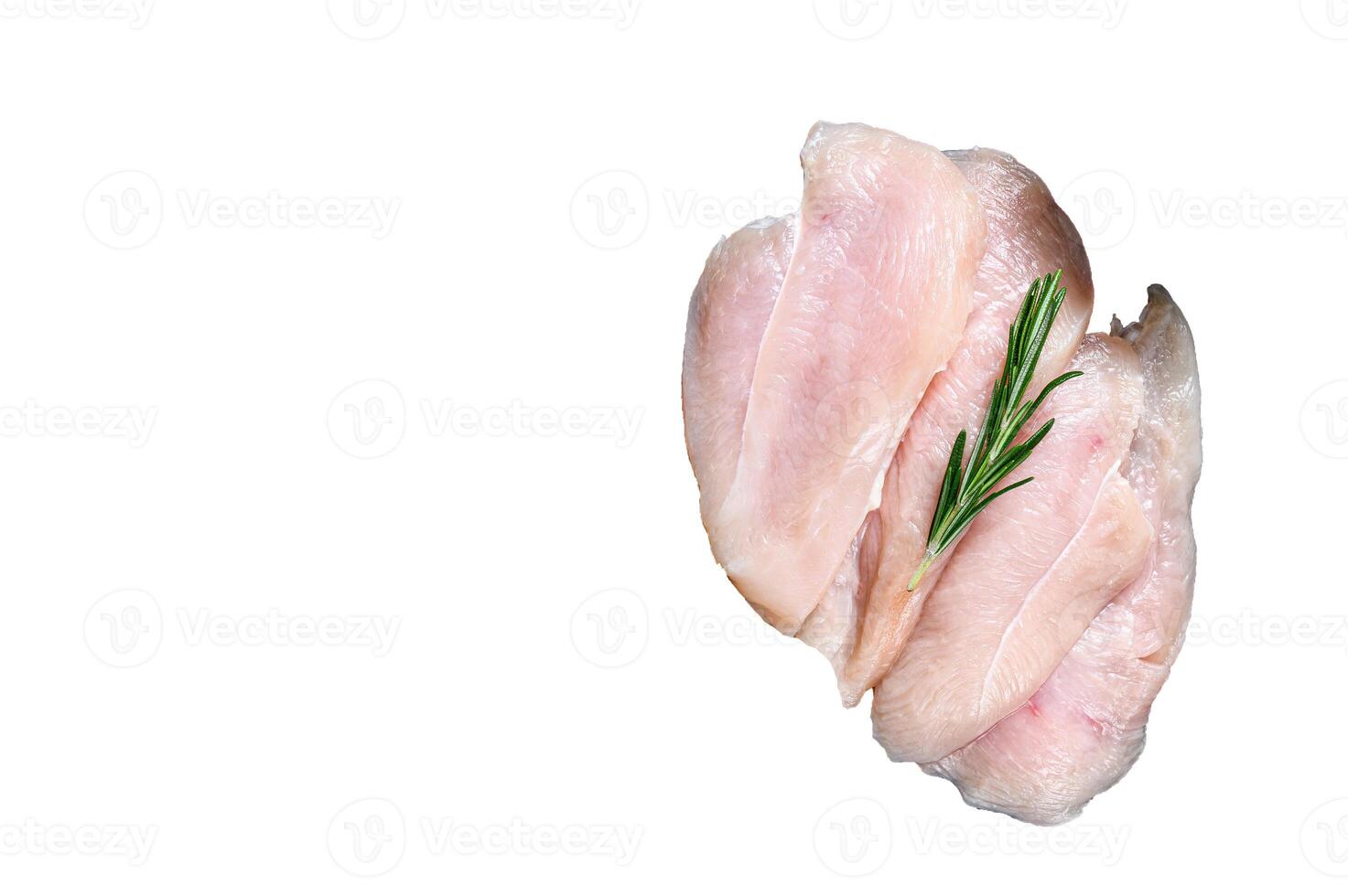 Raw sliced chicken breast fillet steaks on a marble board. High quality Isolate, white background. photo