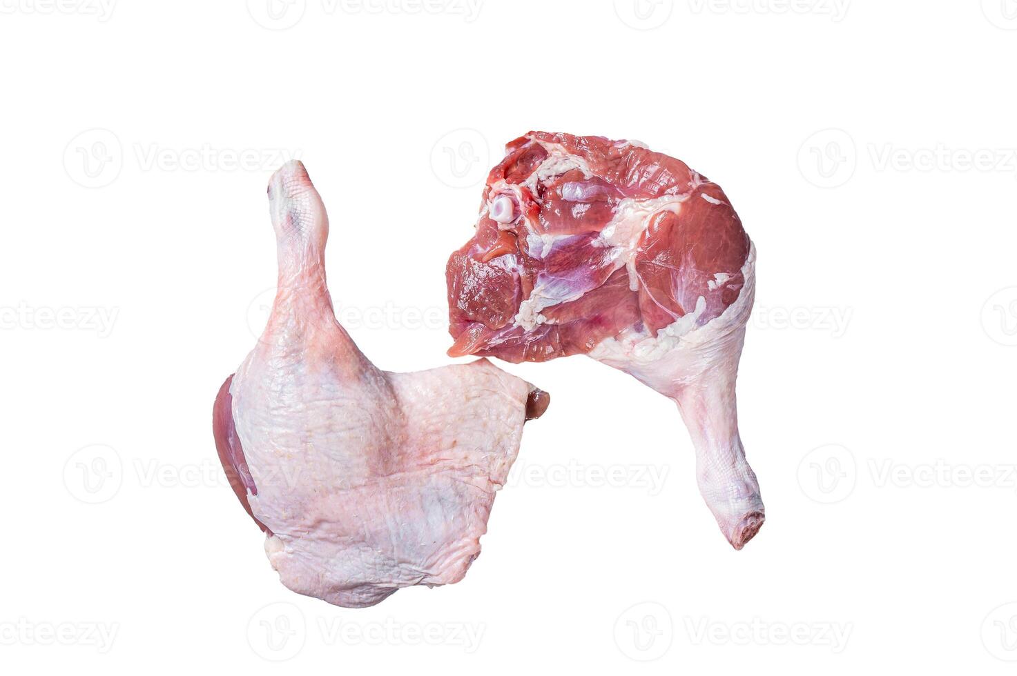 Fresh raw duck legs on a kitchen table. Isolated on white background photo