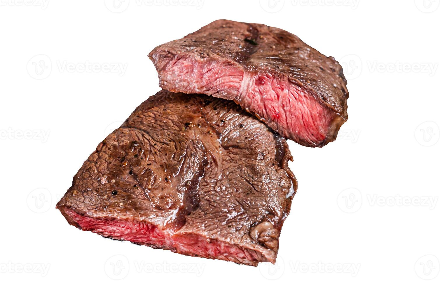 Grilled Top Blade or flat iron roast beef meat steaks on marble board. Isolated, white background. photo