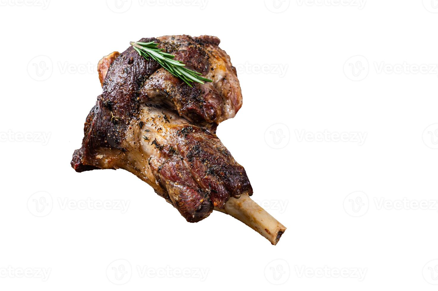 Baked lamb mutton leg meat on a wooden cutting board. High quality Isolate, white background. photo