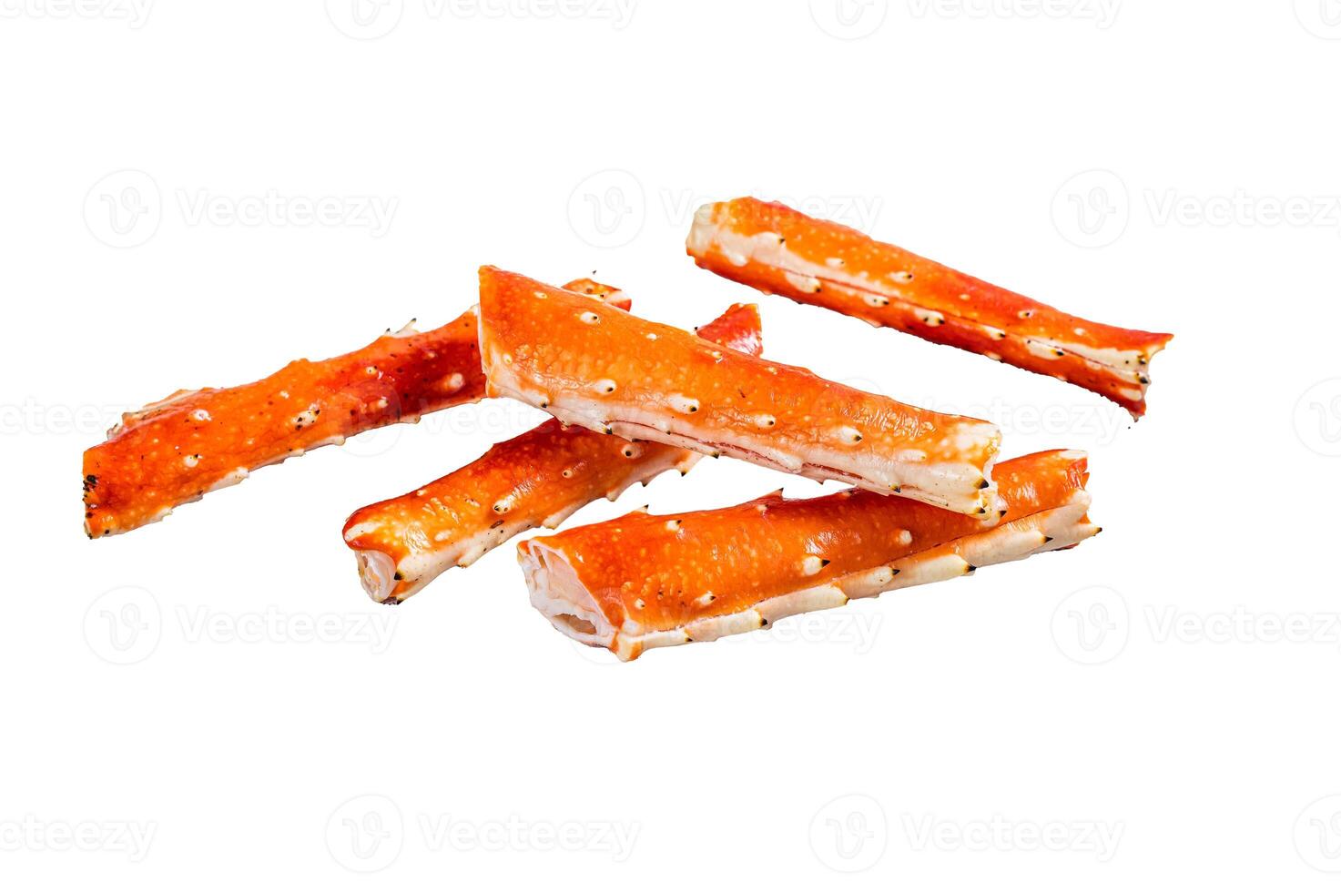 Crab legs Phalanx on a kitchen table. Isolated on white background. photo