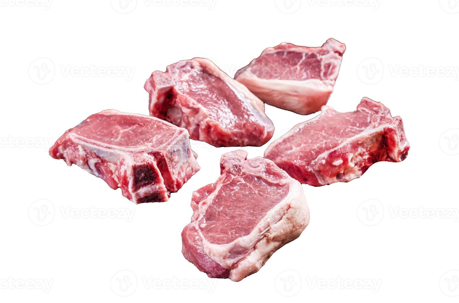 Fresh Raw lamb loin chops steaks, cutlets on butcher board with meat cleaver. Isolated on white background, top view. photo