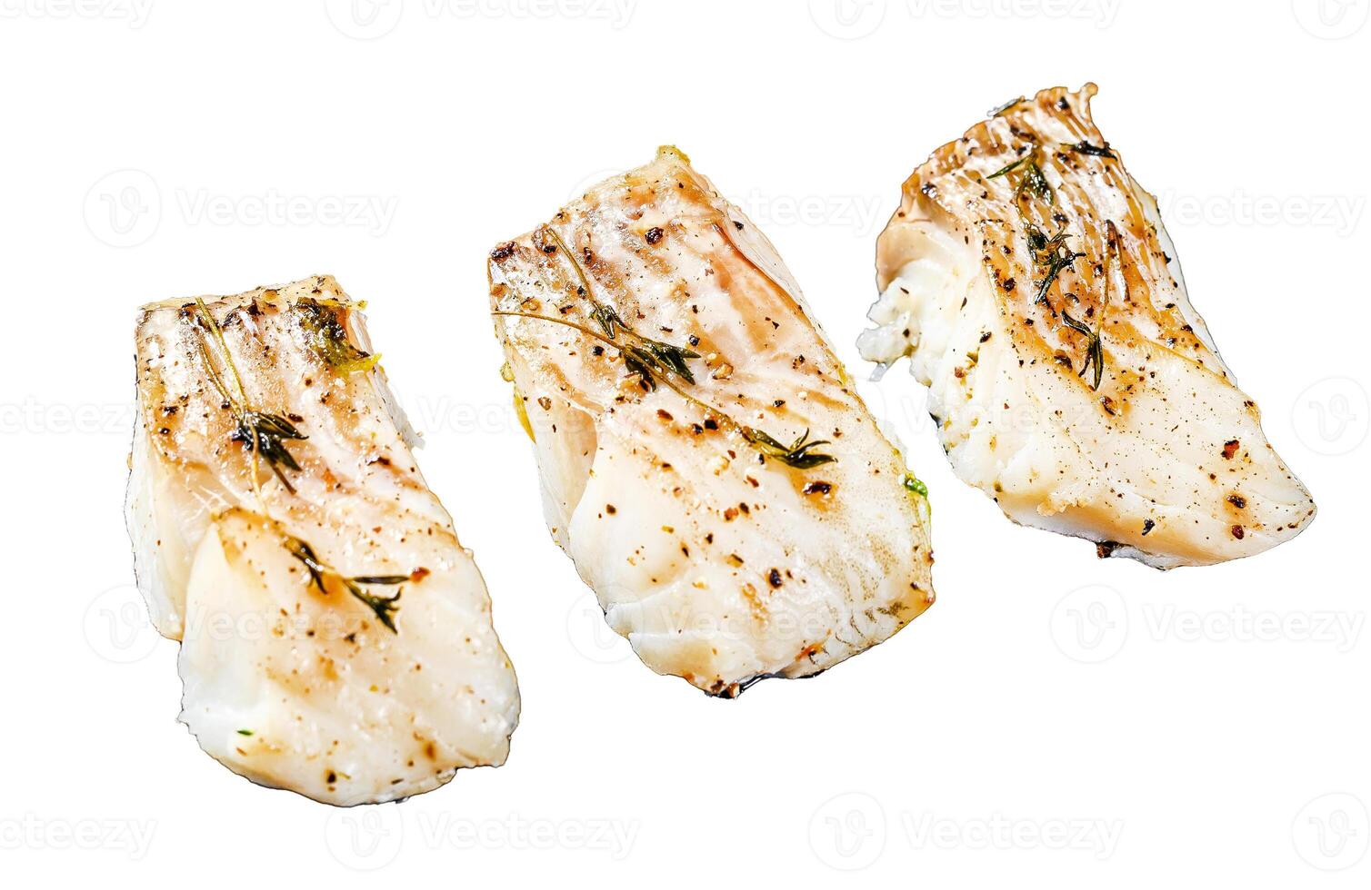 Baked cod fish fillet with spice. Isolated on white background. Top view. photo