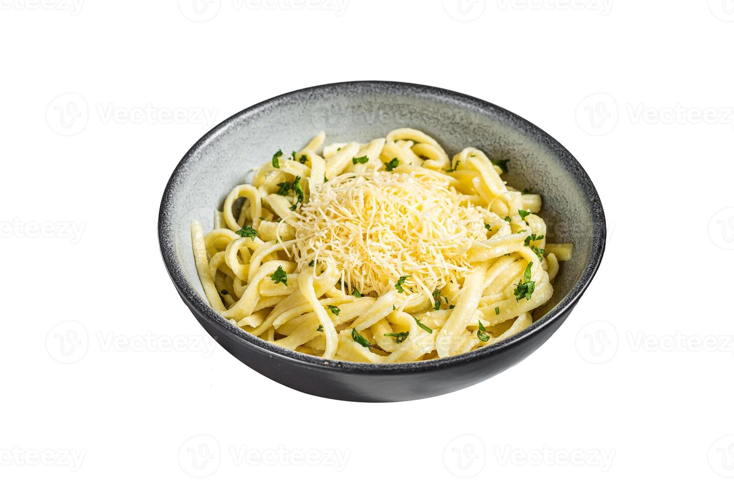 Spaetzle German egg noodles with cheese served with parsley. Isolated on white background. Top view. photo