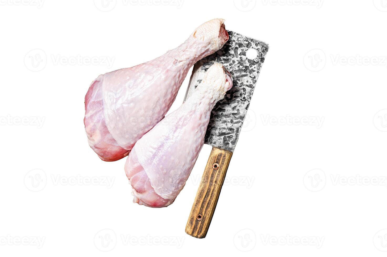 Fresh turkey legs Drumsticks, raw Poultry meat with butcher cleaver Isolated, white background. photo
