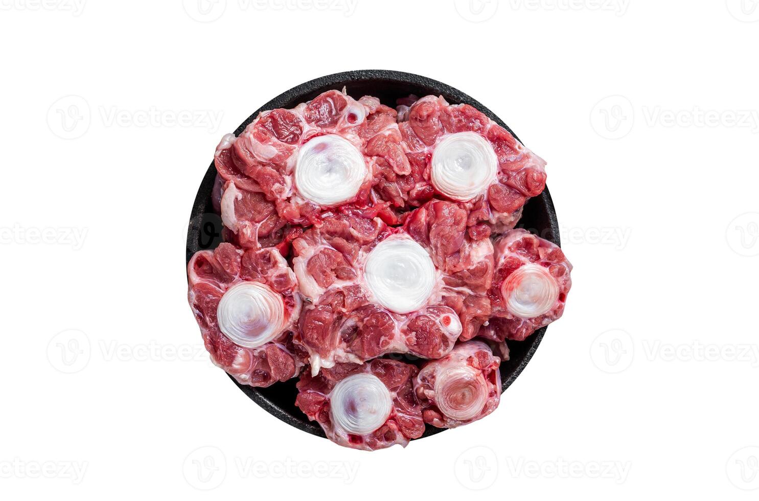 Raw veal beef Oxtail Meat on butcher wooden board with cleaver. Isolated, white background. Top view. photo
