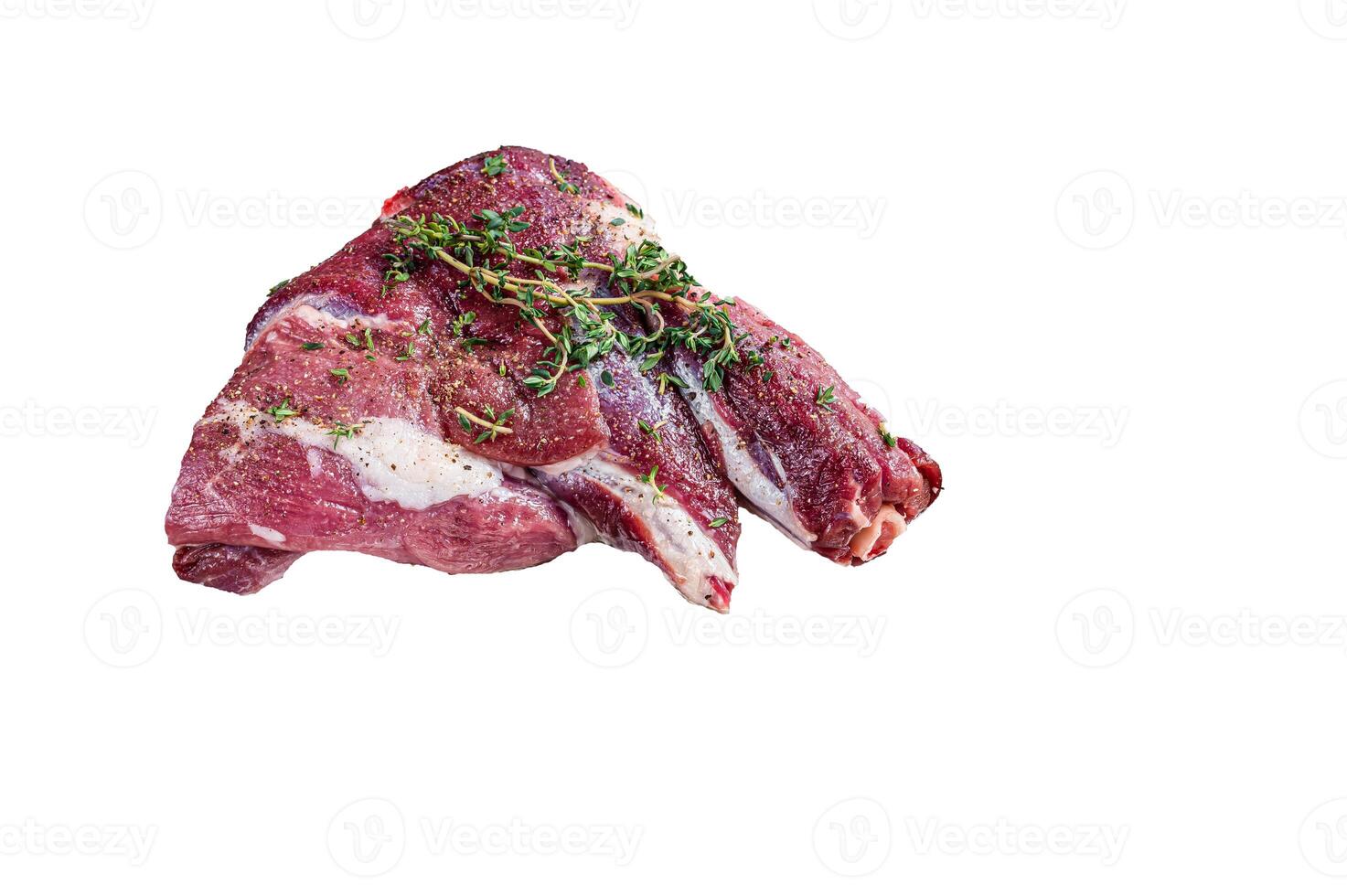 Cooking of Raw lamb mutton leg with thyme, pepper and olive oil in baking tray. High quality Isolate, white background. photo