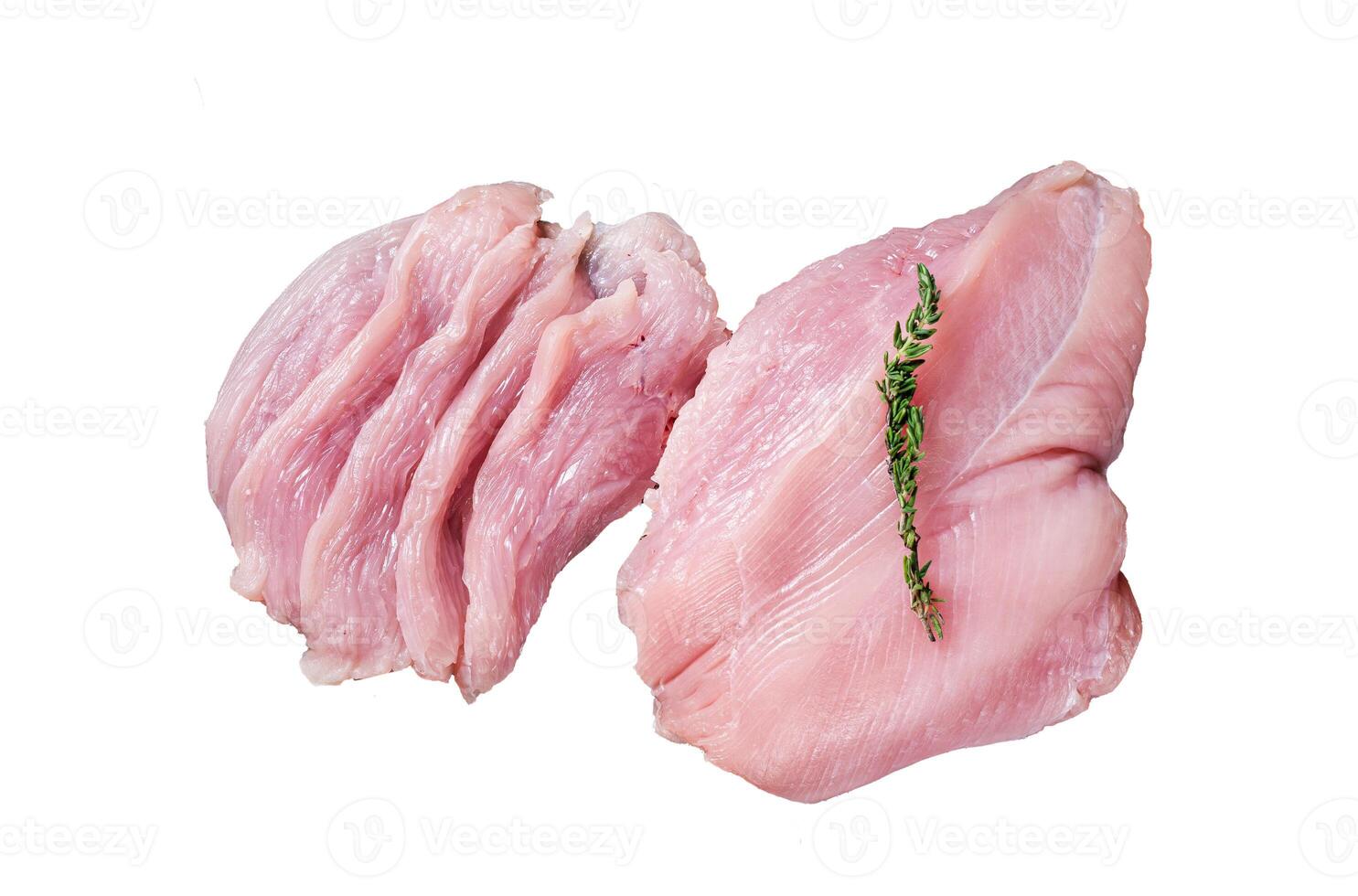 Sliced Raw turkey breast fillet meat on a cutting board with butcher knife. Isolated, white background. photo