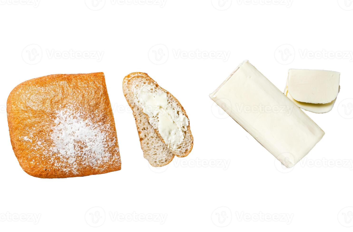 Sliced toast bread with butter spread Isolated on white background, top view. photo