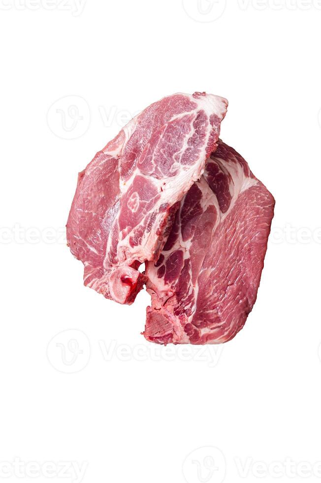 Pork loin steak from raw neck fillet meat on butcher knife. High quality Isolate, white background. photo