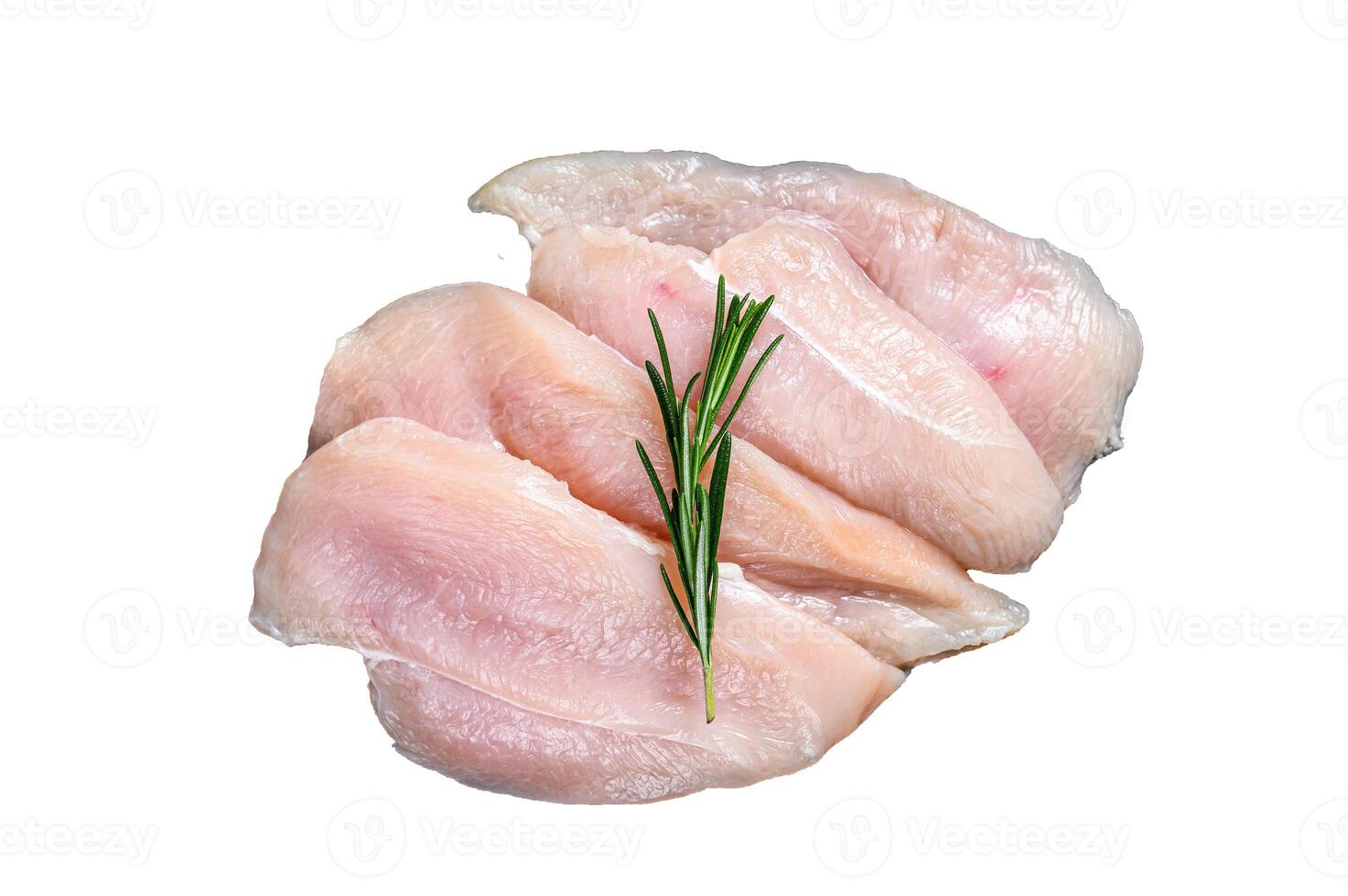 Raw sliced chicken breast fillet steaks on a marble board. High quality Isolate, white background. photo